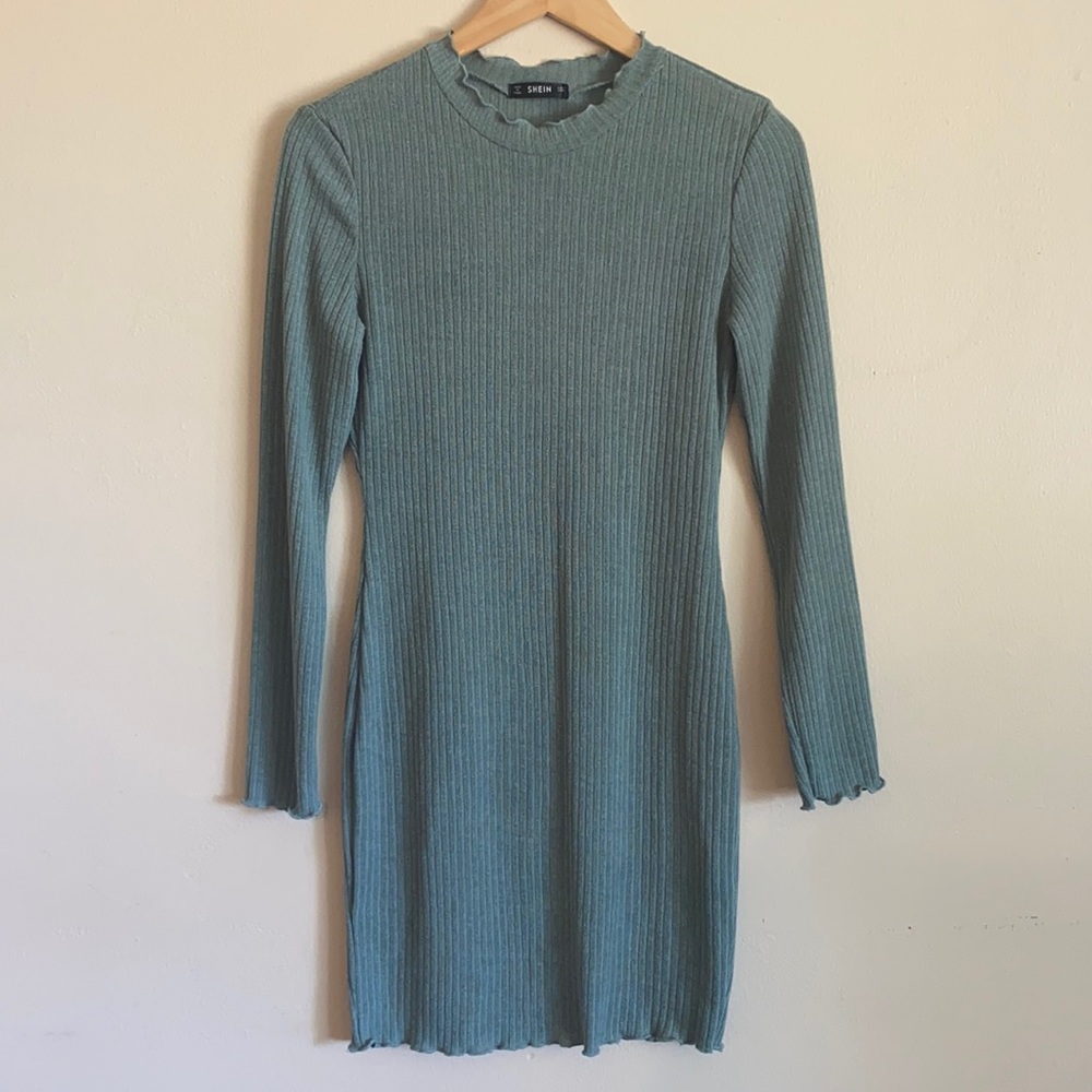 The most beautiful sea foam green (blue?) dress.